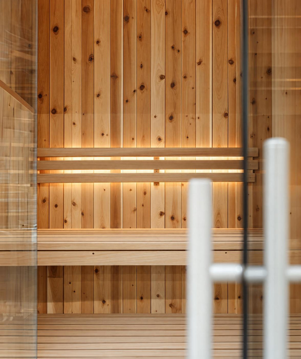 tab = Craft | heading = Thick, insulating walls | body = Tongue-and-groove lumber holds heat and quiets the outside.