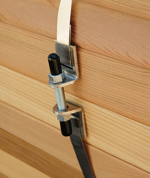 tab = Craft | heading = Thick, insulating walls | body = Tongue-and-groove lumber holds heat and quiets the outside.
